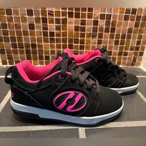 Size 2 pink and black Heelys